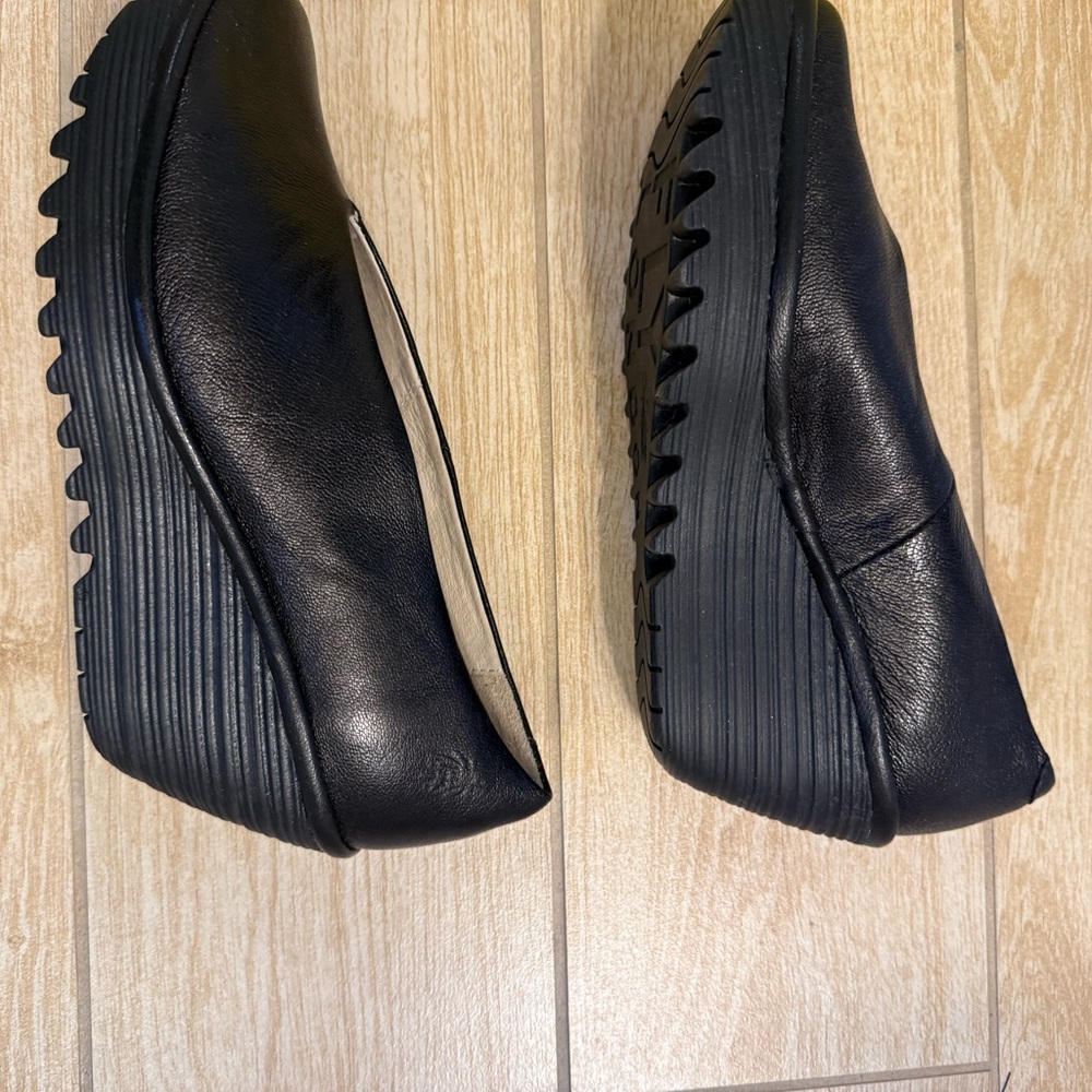 Fly London Black Leather Wedge